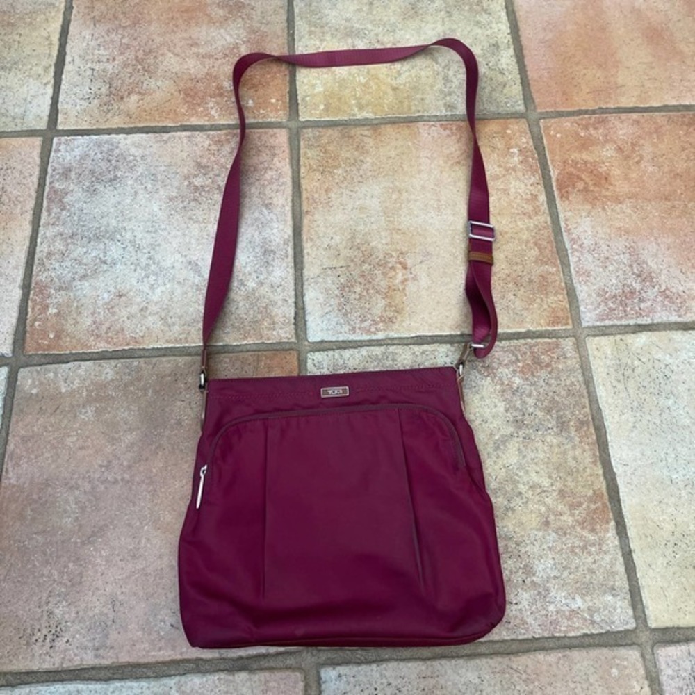 Tumi crossbody travel bag/purse